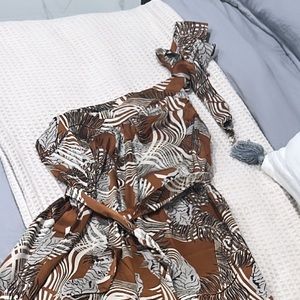 Beautiful Romper. Brand new without tags.